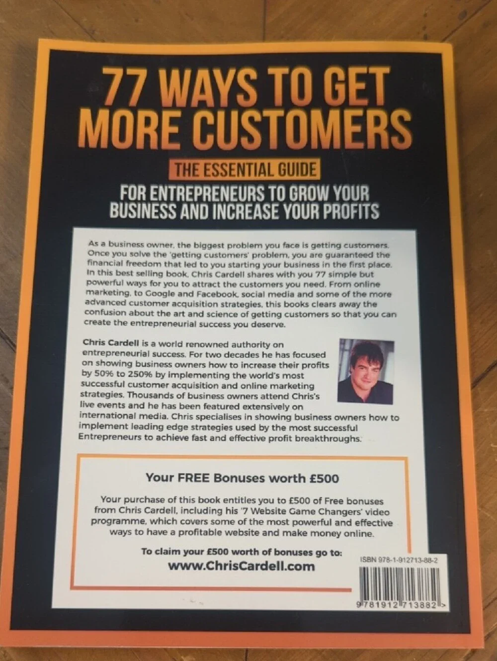 77 Ways To Get More Customers - Black & Orange Business Guide